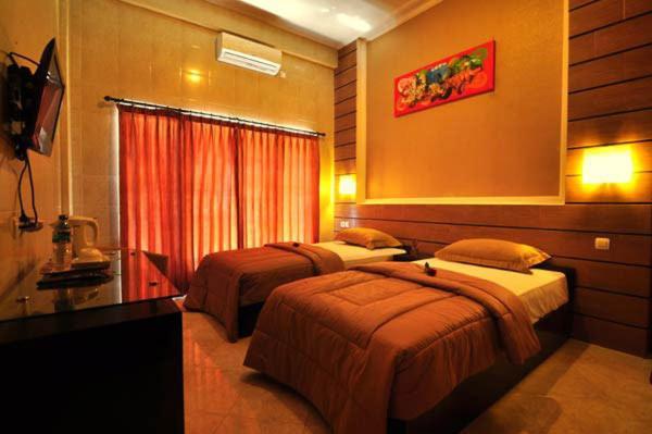 Denays House Hotel Jimbaran Quarto foto